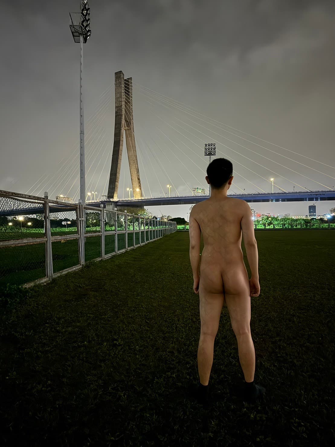 Naked Vigil by the Bridge